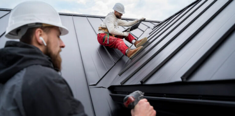 Roofer installing a roof